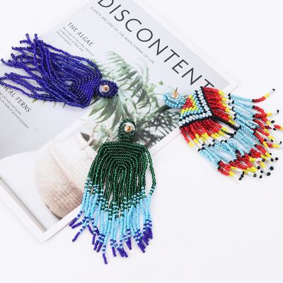 China High quality supplier of boho earrings women personality fashion earrings rice seed pearl tassel earrings for sale