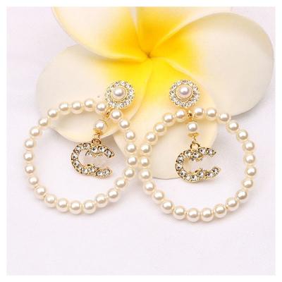 China 2022 high quality pearl charm brand fashion earrings pearl custom circle hoop earrings earring designer for sale