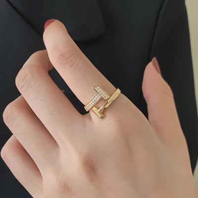 China Trendy Wholesale Simple Women Brand Fashion Rings Designer Jewelry Women Ring Gold T Shape Ring for sale