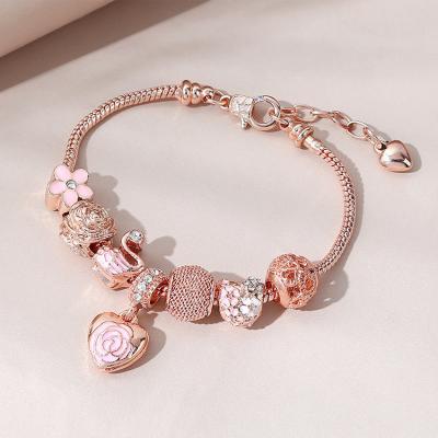 China Best Selling High Quality Oil Drop Flower Charm Bracelet Rose Gold Rhinestone Crystal Flower Heart Charm Bracelet for sale