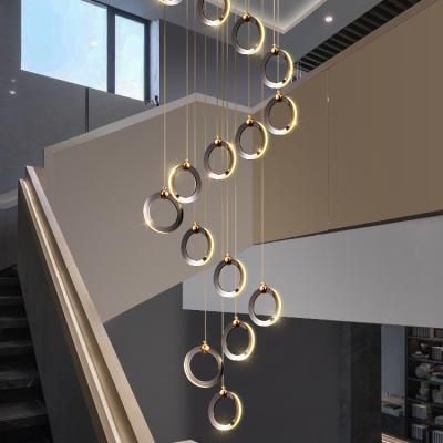 China Modern Post Modern Staircase Light Luxury Hotel Ring Black LED Acrylic Chandelier for sale