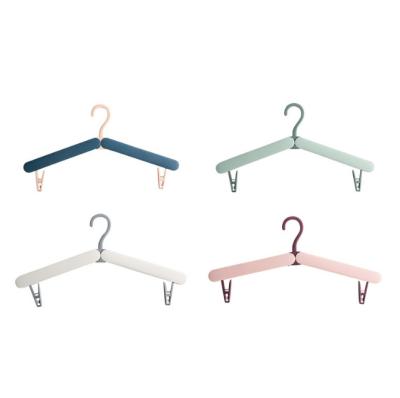 China Bathroom Travel Multifunctional Plastic Folding Rack Portable Foldable Hanger for sale