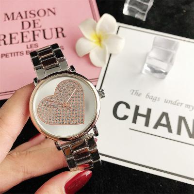 China Top Non-Specific Imported Men's Women's Wrist Watch Online Women's Wristwatches Round Watches Stainless Steel Quartz Luxury Watch for sale