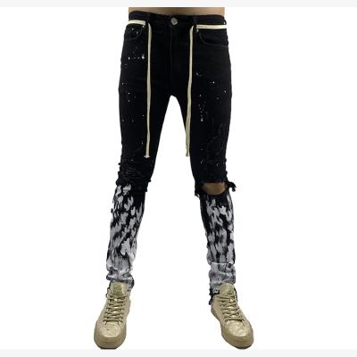 China HUNTW Breathable Custom Wholesale Black Splatter Paint Jeans Fit Man Skinny Hole Ripped Jeans Pants for sale