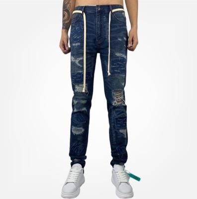 China HUNTW 2020 new breathable factory direct feet knee skinny hole ripped jeans for sale