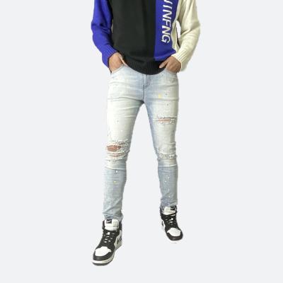 China HUNTW QUICK DRY OEM Customized Denim Light Blue Skinny Designer Ripped Mens Jeans Pants for sale