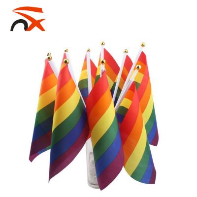 China Wholesale Custom Hanging Rainbow Hand Flag With Sticks for sale