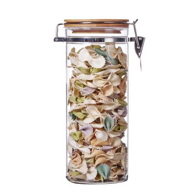 China Hot Selling Luxury Borosilicate Glass Microwavable Big Tall Jar With Bamboo Clip Lid for sale