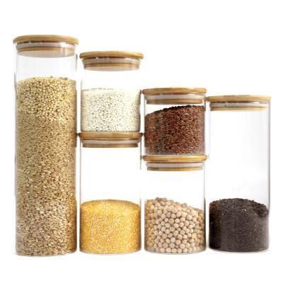 China Heatable hot sell airtight sealed round square transparent clear kitchen glass food storage containers spice jars with bamboo lids set for sale