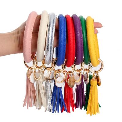 China BOHO Style Wristband Designer Round Key Chain PU Car Keychain Wristband Wristband Accessories With Metal Key Holder AS-321 for sale