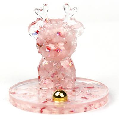 China Folk Art Wholesale Natural Crystal Chips Stones Rose Quartz Deer Open Cell Phone Holders Pamper Anime Crystal Ornament For Gift for sale