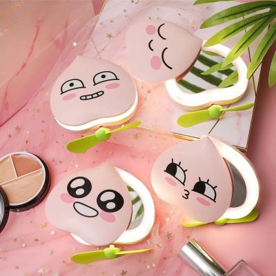 China Makeup Mirror China Factory Sale Style Heart Shape Peach Pink New Lighting Makeup Mirror USB Rechargeable Battery Mini Fan for sale