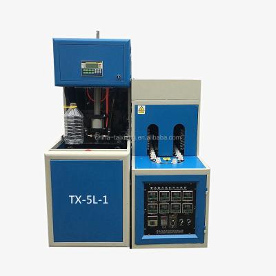 China semi-automatic PET ,2l,2.5l,5L oil bottle blowing machine ,factory price for sale