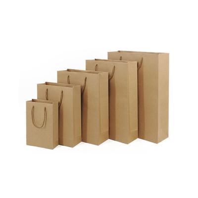 China Different Size Handmade Brown Kraft Gift Wrapping Paper Wholesale Custom Shopping Paper Bags With Handle for sale