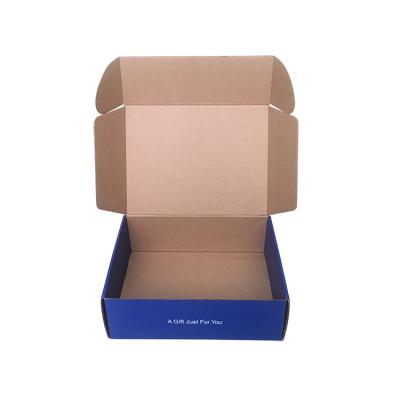 China Handmade Blue Color Embossed Logo Custom Design Corrugated Apparel Packaging Box For Shipping for sale