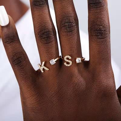 China Fashion Gold Plated Initial Letter Finger Ring Adjustable Diamond Women for sale