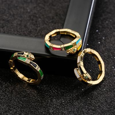 China Fashion Women Shape Jewelry CZ Zircon Copper Plated 18K Gold Color Oil Drip Zircon Retro Snake Opening Adjustable Rings for sale