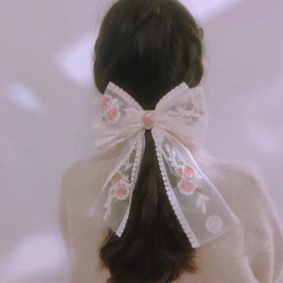 China Fixed and trinket decoration in large fashionable women's stock girls hair accessories lace up bow ribbon hair clips for sale