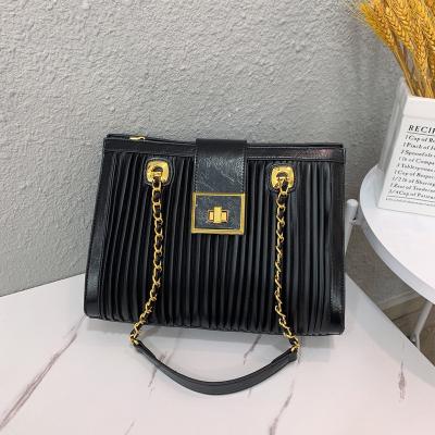 China 2022 fashion handbag women's tote bags vertical large capacity grain lady bag shoulder bag luxury handbags for women for sale