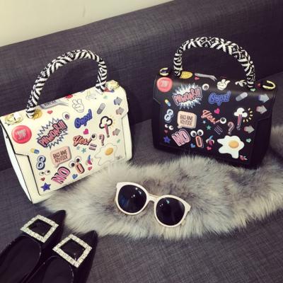 China Cartoon Printing Guangzhou Hot Sale Leather Handbags Kids Graffiti Bags Purses and Clutch Purse OEM Women Handbags for sale