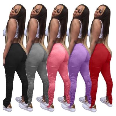 China 2021 Solid Color Sweatshirt Fabric QUICK DRY Pants Ruched Side Pleated Slit Flared Pocket Lane Stacked Legging Pants For Women for sale