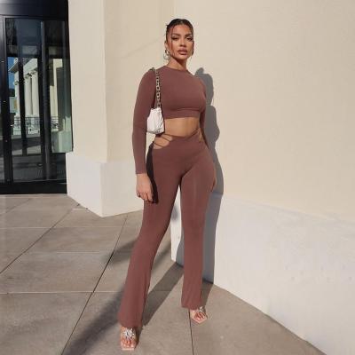 China Autumn 2021 Breathable New Arrivals Fashion Skinny Sexy Casual Solid Long Sleeve Tops And Hollow Out Pants Suits Two Piece Set Women for sale