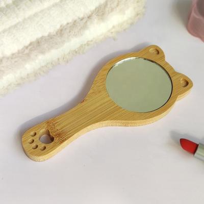 China Customized Customized Laser Engraved Lover Promotional Cute POW Girl Cat Girl Care Tool Beauty Bamboo Wooden Hand Mirror for sale