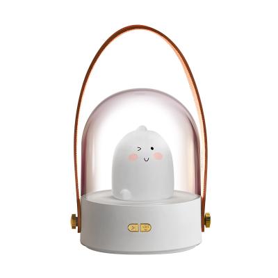 China New-designed cute new cartoon small animal table lamp can play music rechargeable silicone LED atmosphere night light for children for sale