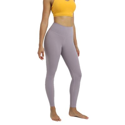 China Wholesale custom tight fit high waisted sexy girl leggings slimming workout clothes nylon and lycra women nude yoga pants for sale