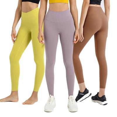 China Wholesale custom tight fit high waisted sexy girl leggings slimming workout clothes nylon and lycra women nude yoga pants for sale