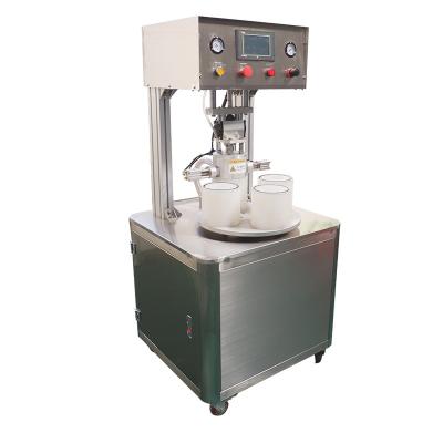 China Manual Rotary Four Heads PET Bottle Twist Off Lug Vacuum Capping Machine Cap Retorquer Machine for sale