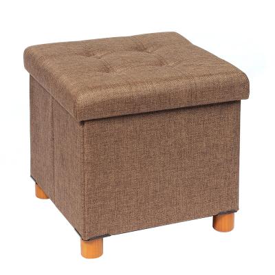 China Removable Cover Fabric Foldable Storage Ottoman Stool With Wooden Legs Coffee Table With Lid Tray for sale