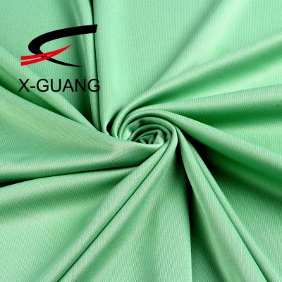 China Solid 4 Way Stretch Polyester Spandex Shrink-Resistant Interlock Knit Stretch Fabric For Sportswear 200GSM for sale