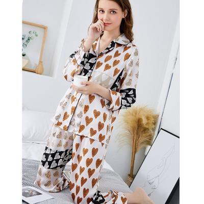 China Heart pattern mulberry silk wholesale QUICK DRY silk pajamas printed washable natural pajamas for sale