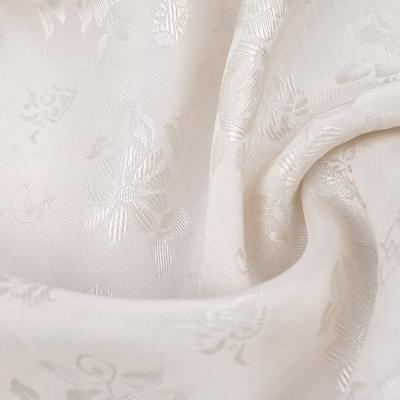 China Small floral shiny undyed silk fabric wholesale high end viable 100% silk fabric for shirt for sale