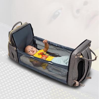 China Multifunctional Purpose 4 in 1 Foldable Baby Crib Travel Baby Crib Diaper Bag Backpack Convertible Bag for Sleeping for sale