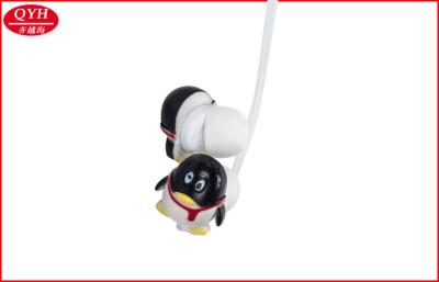 China Carrete bidireccional de los auriculares de botón del cable retráctil del pingüino del auricular lindo del diseño en venta