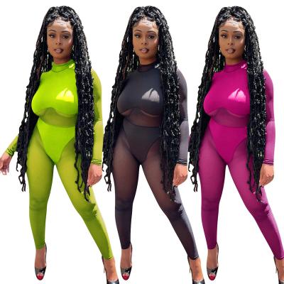 China 2022 summer women ladies clothing one piece solid color mesh hollow QUICK DRY sexy jumpsuit see jumpsuit for sale