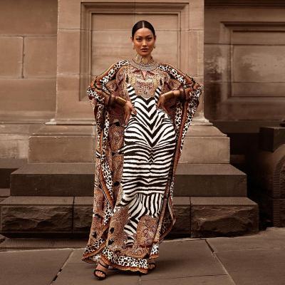 China Elegant muslim women party zebra stripe workmanship middle east polyester abaya african islam clothing maxi dress for sale