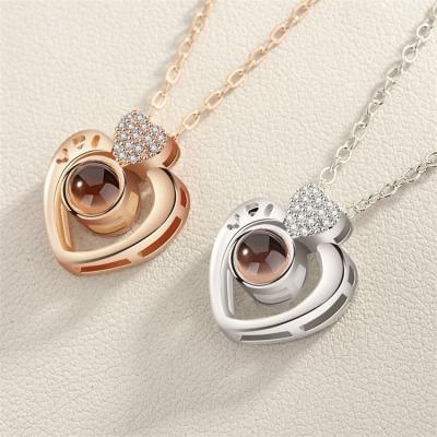 China 2021 Nickel Free Fashion Valentines Day Gifts 100 Languages ​​Couples Clavicle Chain Personalization Memory Projection Zircon Pendant Necklace for sale