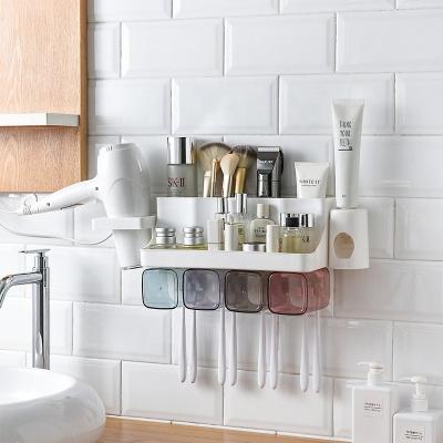 China Amazon Hot Sale Bathroom Wall Mounted Storage Rack Plastic Brush Holder And Automatic Toothpaste Dispenser for sale