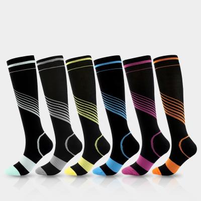 China Hot Selling Breathable High Elastic Sports Soccer Basketball Compression Sports Socks For Men Bumps Sports Running for sale