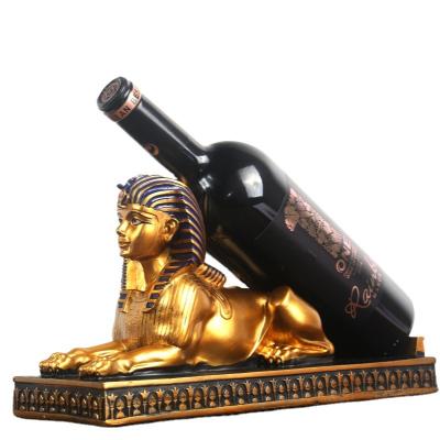 China European Style Pharaoh Sphinx Human Face Red Wine Rack Fashion Home Decoration Resin Egyptian Wine Rack for sale