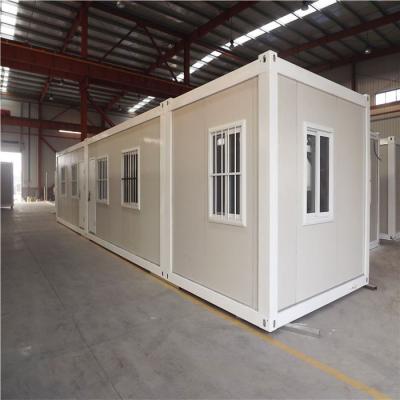 China 50mm waterproof eps sandwich panel 20ft foldable container house for labour camp for sale