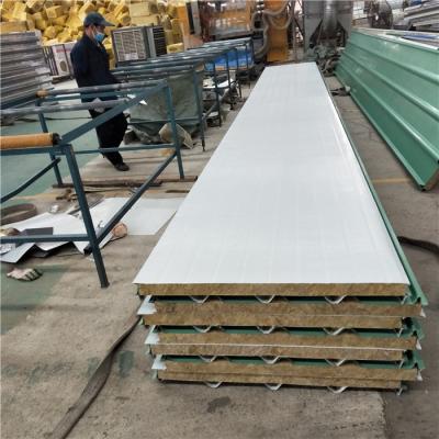 China rock wool sandwich panel cover with 0.426mm lotus green steel up and orange peel steel down for sale