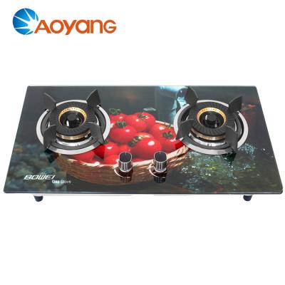 China Household 3D Design Tempered Glass Top Double Burner Brass Gas Hob for sale