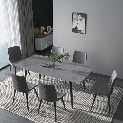 China Waterproof Luxury Modern Royal Part 6 Chairs Dining Table With Sintered Stone for sale