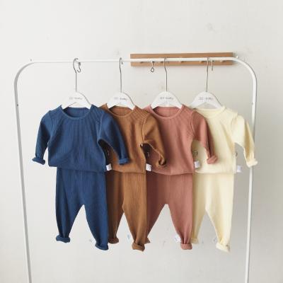 China Cheap Antibacterial Unisex Newborn Baby Clothes Solid Color Ribbed 2PCS Kids Pajamas Sets Cotton Knitted Newborn Baby Boy Clothing Sets for sale