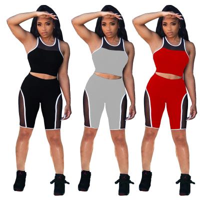 China Dropshipping QUICK DRY 2021 women color block set gym sports wear to mesh summer two piece short women sets for sale