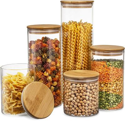 China Freshness Preservation Canister Set of 5 Glass Kitchen Canisters with Airtight Bamboo Lid Glass Storage Jars for Kitchen Organization For Flower Sugar for sale